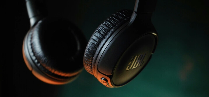 Person using headphones for solfeggio frequency listening
